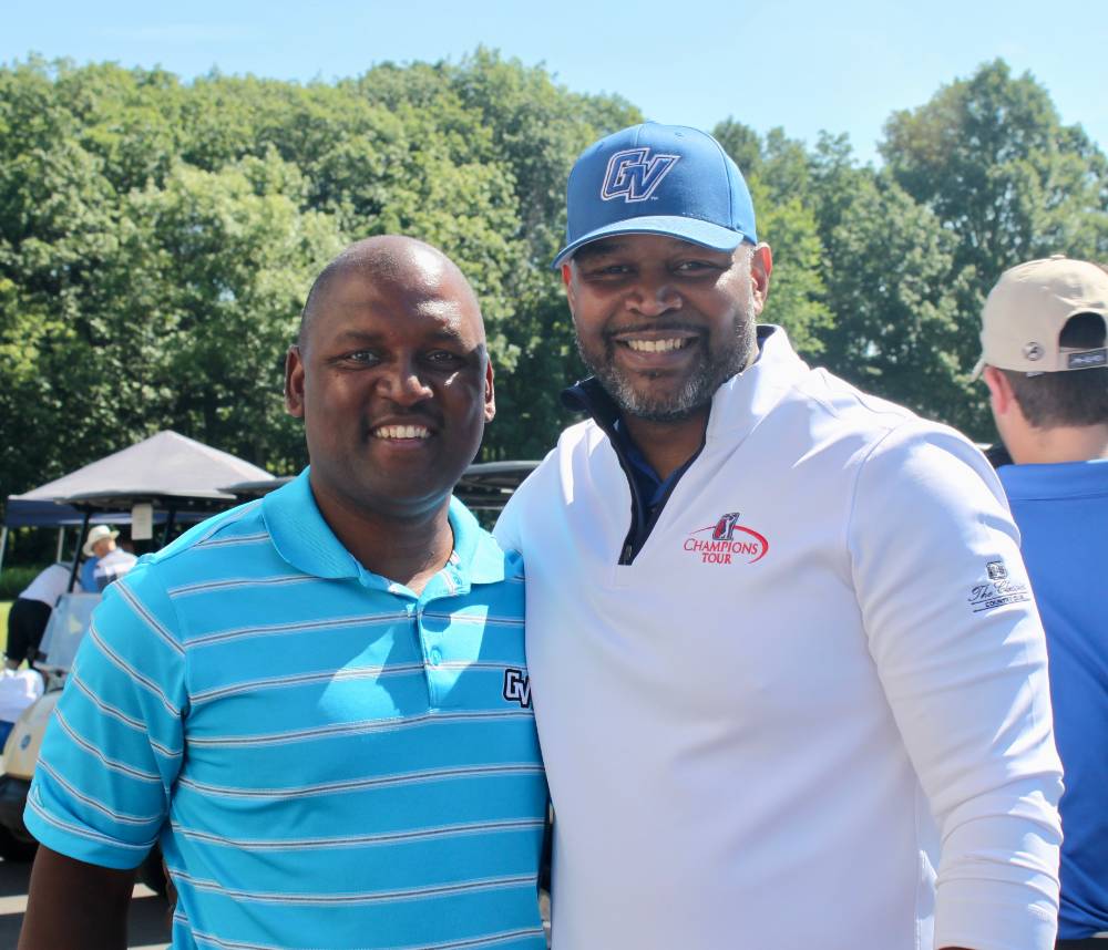 picture of two men at golf event